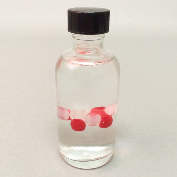 The phenomenon of beads suspended in a liquid are used to investigate matter and its interactions